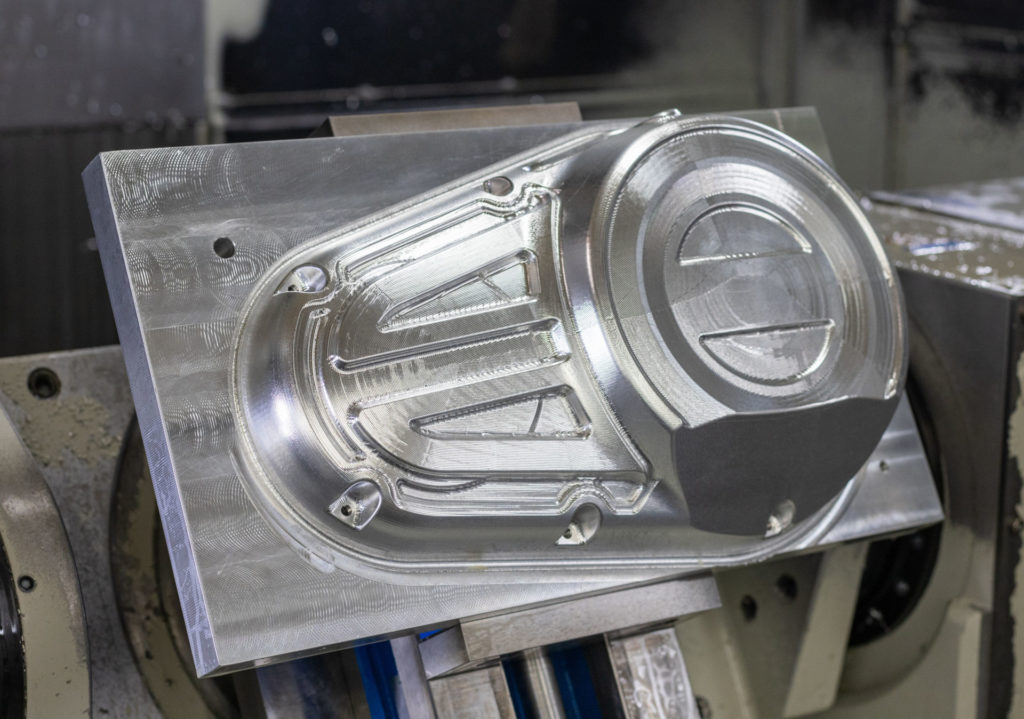 S&S Cycle machined a new billet aluminum primary drive case cover with a beveled lower portion to provide extra cornering clearance. Photo courtesy S&S Cycle and MotoAmerica.