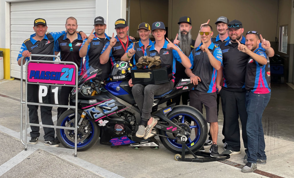 The Daytona 200-winning TSE Racing team: (from left) Scott Jensen, Justin “Bubba” Conolty, Mike Sulzer, team owner Mark Stiles, team manager Meghan Ryan (Stiles’ daughter), Brandon Paasch, Scotty Ryan (Meghan‘s husband), Nathan Oldenburg, Kevin Gorman, Chris Quillman, and Eziah Davis. Photo by Stefan Dolipski, courtesy TSE Racing. 