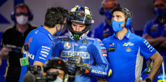 Joan Mir (center) with his Crew Chief Frankie Carchedi (left) and another crew member in Qatar. Photo courtesy Suzuki ECSTAR Team.
