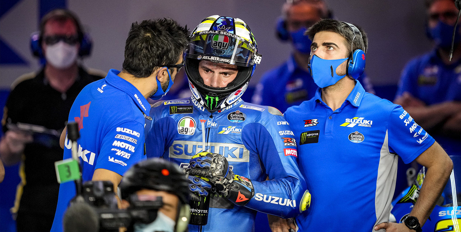 Joan Mir (center) with his Crew Chief Frankie Carchedi (left) and another crew member in Qatar. Photo courtesy Suzuki ECSTAR Team.