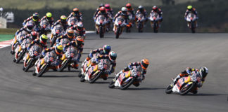 David Alonso (80) leads the start of Red Bull MotoGP Rookies Cup Race 2 in Portugal. Photo courtesy Red Bull.