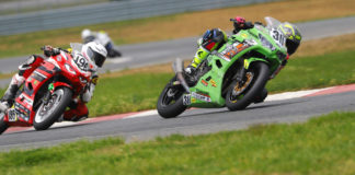 Kayla Yaakov (311) leads Gus Rodio (196) during the ASRA Moto3 National at New Jersey Motorsports Park. Photo by etechphoto.com, courtesy ASRA.