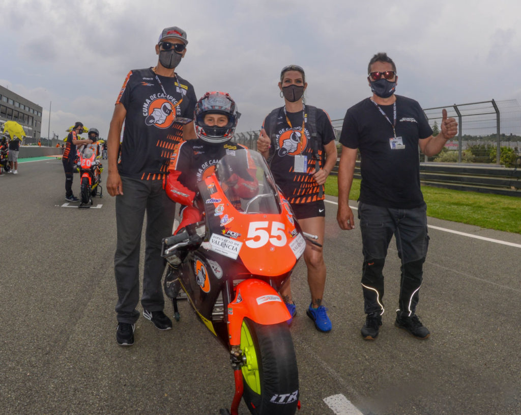 Mikey Lou Sanchez (55) on the the grid in Spain with (from left) father Michael Sanchez, mother Trinity Richardson, and trainer Jose Pino. Photo courtesy Sanchez Racing.