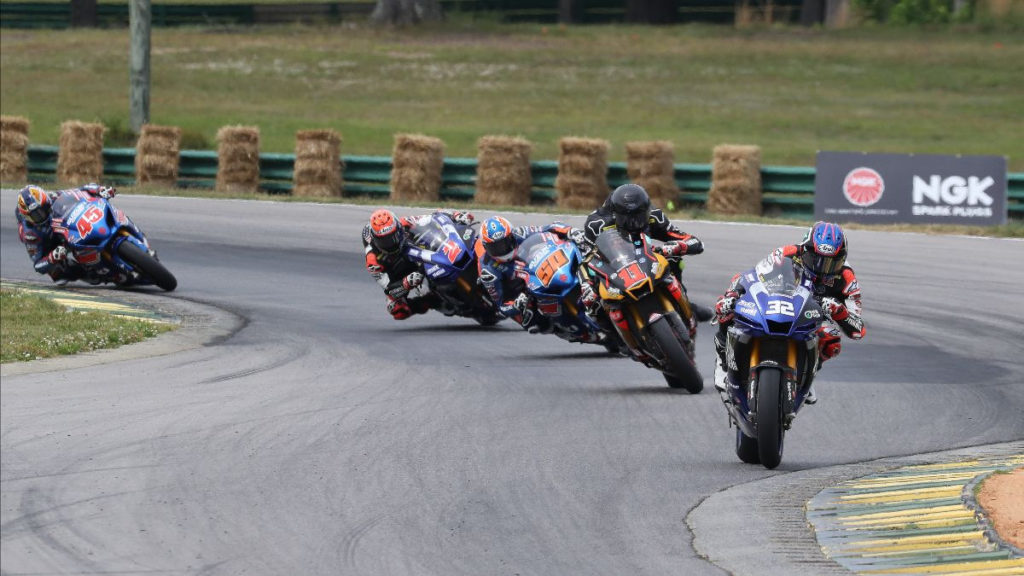 Jake Gagne (32) leads Mathew Scholtz (11), Bobby Fong (50), Josh Herrin (2), and Cameron Petersen (45) early in MotoAmerica Superbike Race One. Photo by Brian J. Nelson, courtesy MotoAmerica.