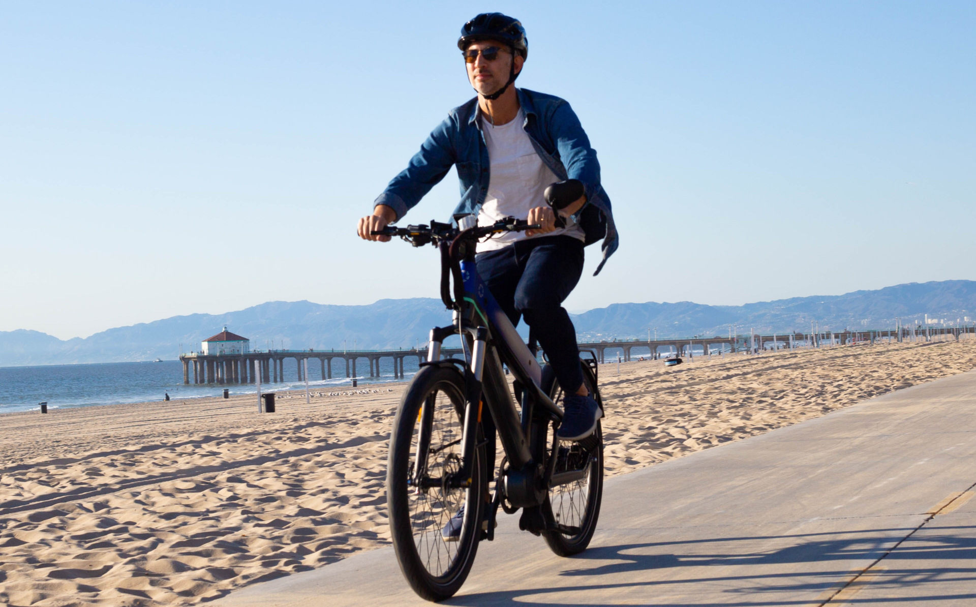 A rider on a FUELL Flluid-1S electric bicycle. Photo courtesy FUELL.