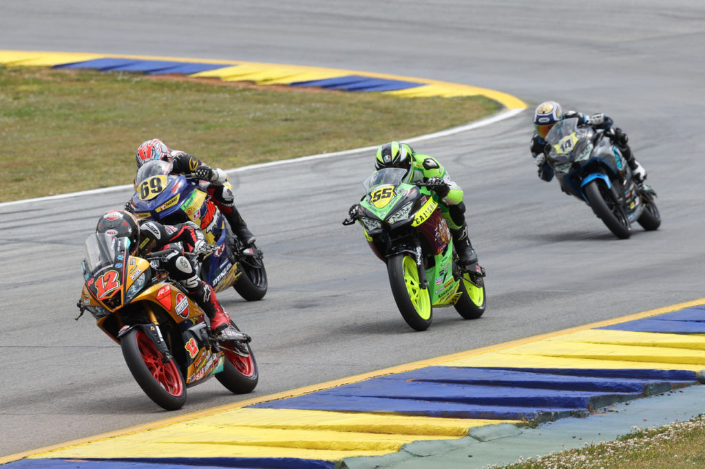 Jack Roach (12) leads a group of Junior Cup riders. Photo by Brian J. Nelson, courtesy Westby Racing.