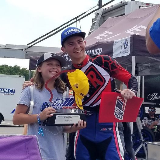 Jackson Blackmon with a young fan at VIR. Photo courtesy Jackson Blackmon Racing.