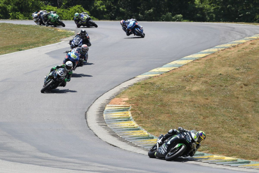 Richie Escalante (1) leads Stefano Mesa (37), Sean Dylan Kelly (40), Benjamin Smith (88), Sam Lochoff (44), and the rest of the field in Supersport Race Two. Photo by Brian J. Nelson, courtesy MotoAmerica.