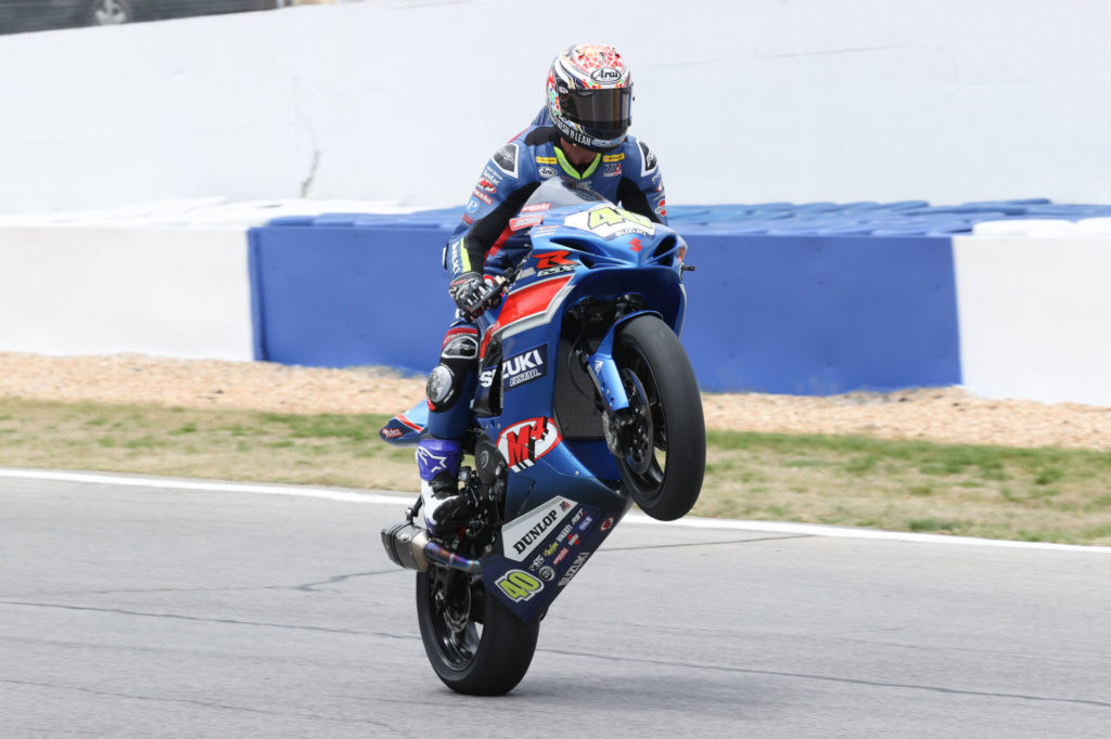 Sean Dylan Kelly wheelies his M4 ECSTAR Suzuki after winning the Supersport race for the second day in a row on Sunday. Photo by Brian J. Nelson