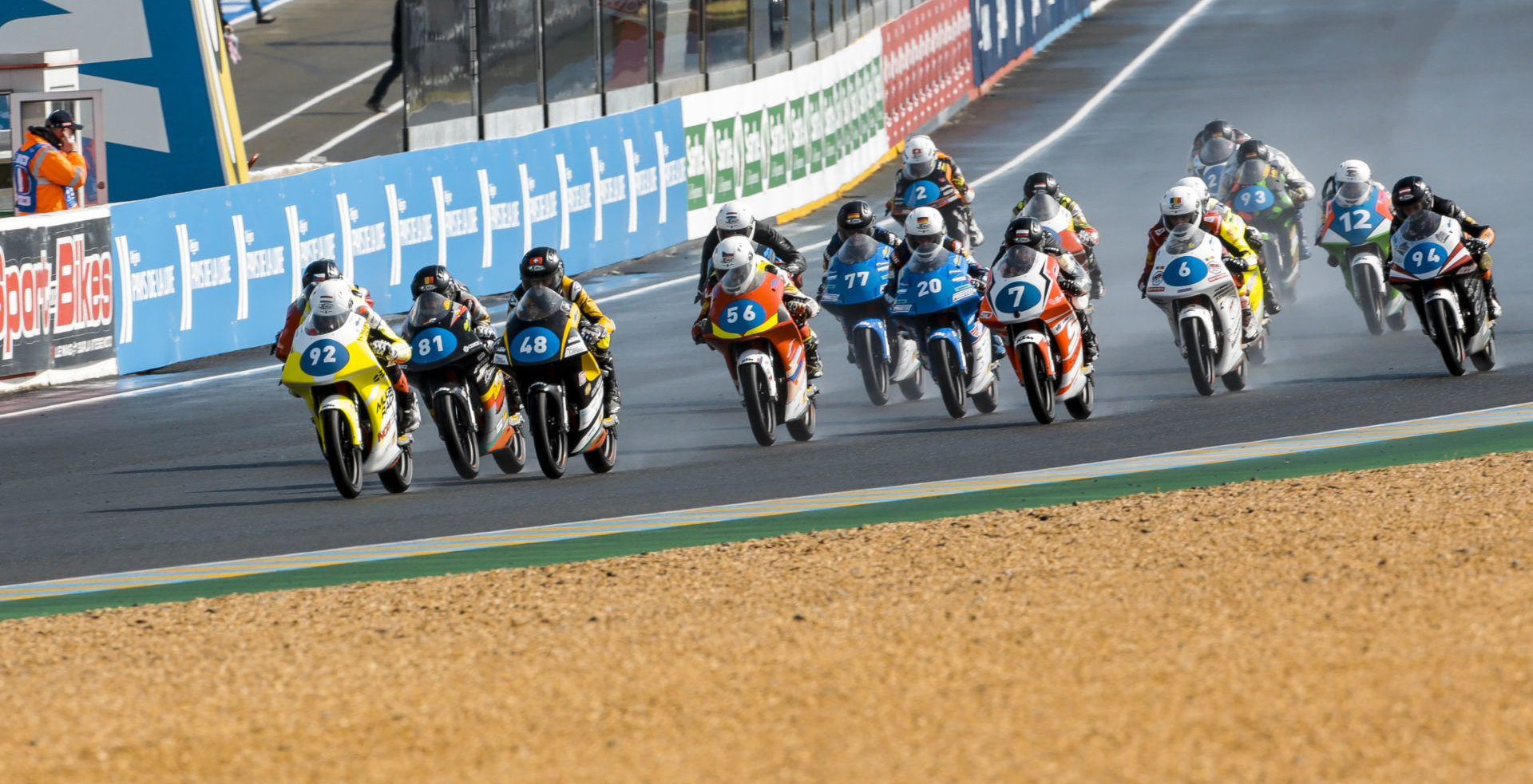 Hungarian-American Rossi Moor (92) leads the start of Northern Talent Cup Race One at Le Mans. Photo courtesy Dorna.