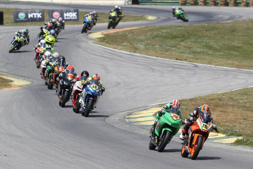 Tyler Scott (70) leads Cody Wyman (34), Max VanDenBrouck (48) and the rest of the field early in Junior Cup Race Two. Photo by Brian J. Nelson, courtesy MotoAmerica.