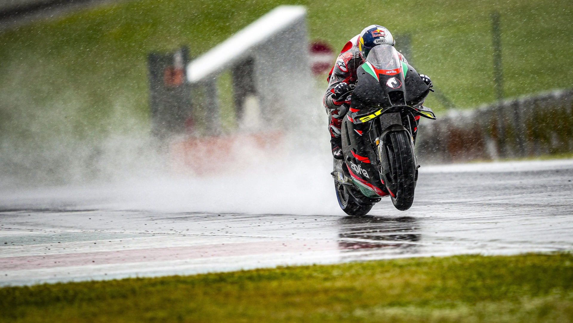 Andrea Dovizioso testing an Aprilia RS-GP MotoGP bike in the wet at Mugello. Photo courtesy Aprilia.