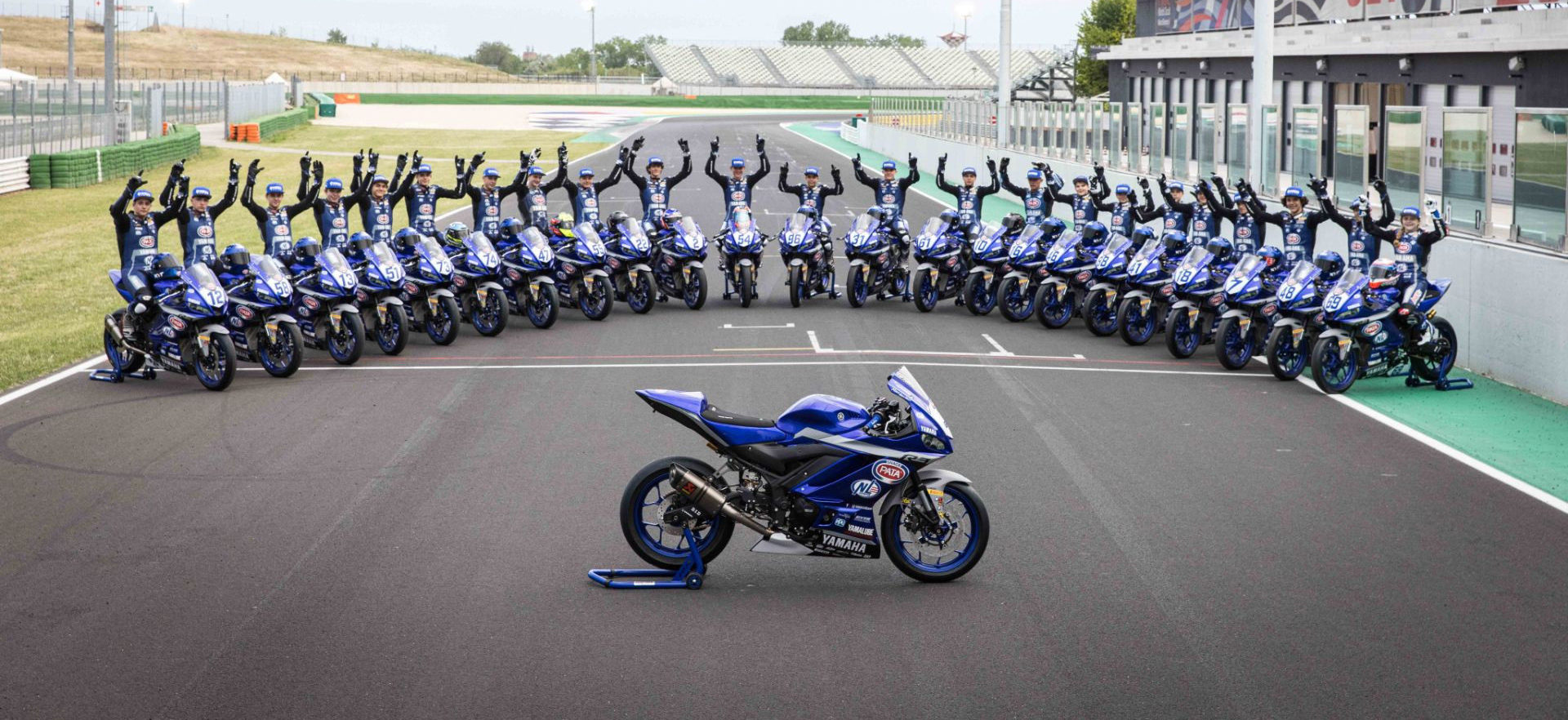 Yamaha R3 bLU cRU European Cup participants with American Kayla Yaakov at the far right. Photo courtesy Yamaha Racing.