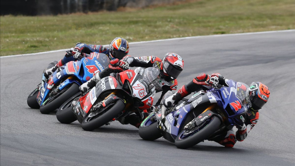 Josh Herrin (2) leads Loris Baz (76) and Cameron Petersen (45) in a fight for third place. Photo by Brian J. Nelson, courtesy MotoAmerica.
