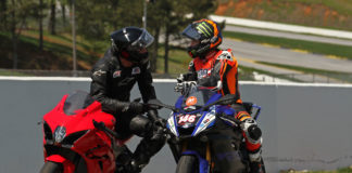 Guest instructor Roger Hayden (right) working with a YCRS student. Photo courtesy Yamaha Champions Riding School.