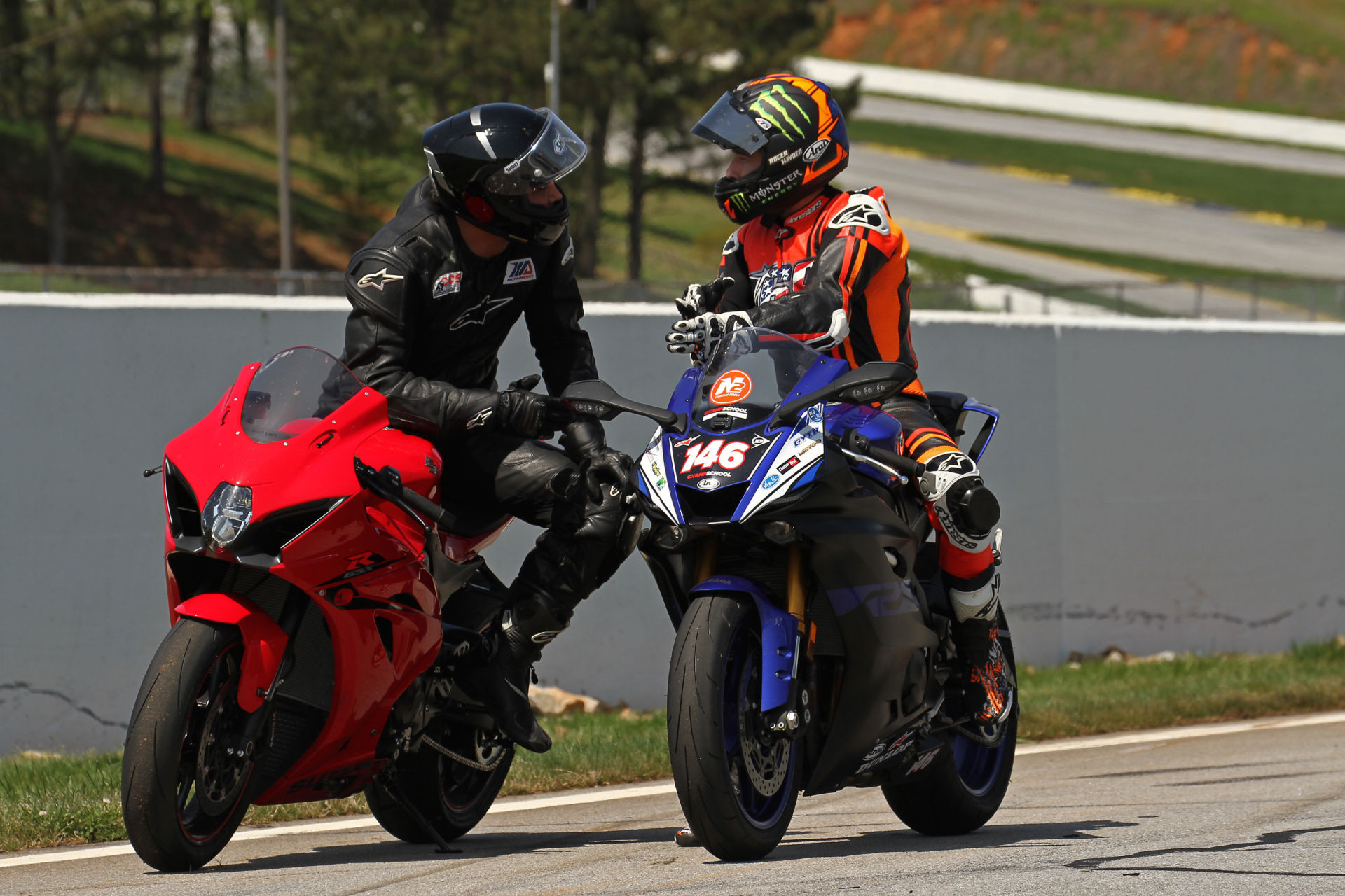 Guest instructor Roger Hayden (right) working with a YCRS student. Photo courtesy Yamaha Champions Riding School.