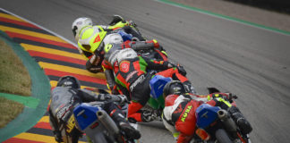 Action from Northern Talent Cup Race One at Sachsenring, with Hungarian American Rossi Moor leading. Photo courtesy Dorna.