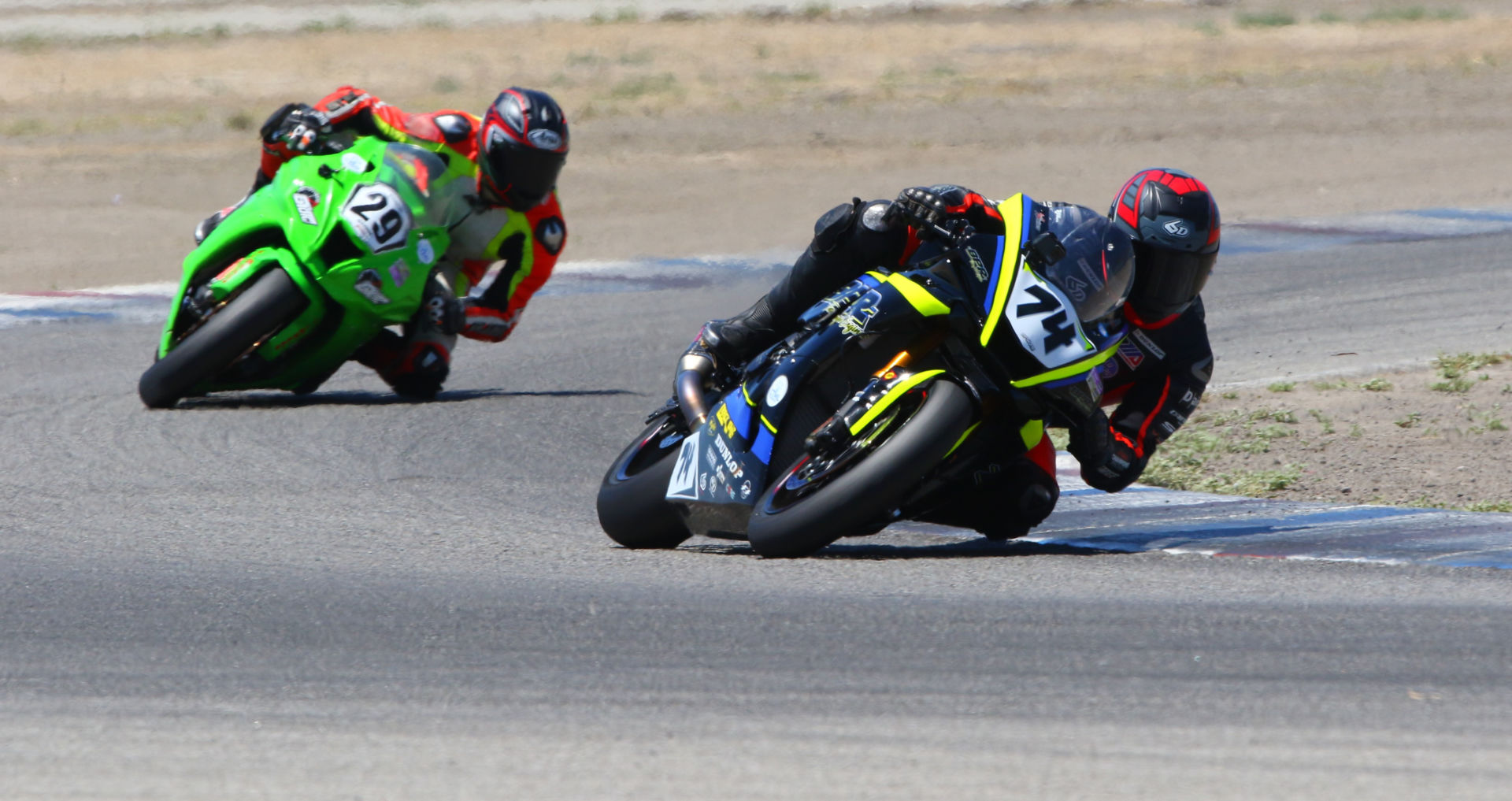 Bryce Prince (74) leads Jack Bakken (29) early in the 12-lap RiderzLaw Gold Cup race at Buttonwillow Raceway Park. Photo by CaliPhotography.com, courtesy CRA.