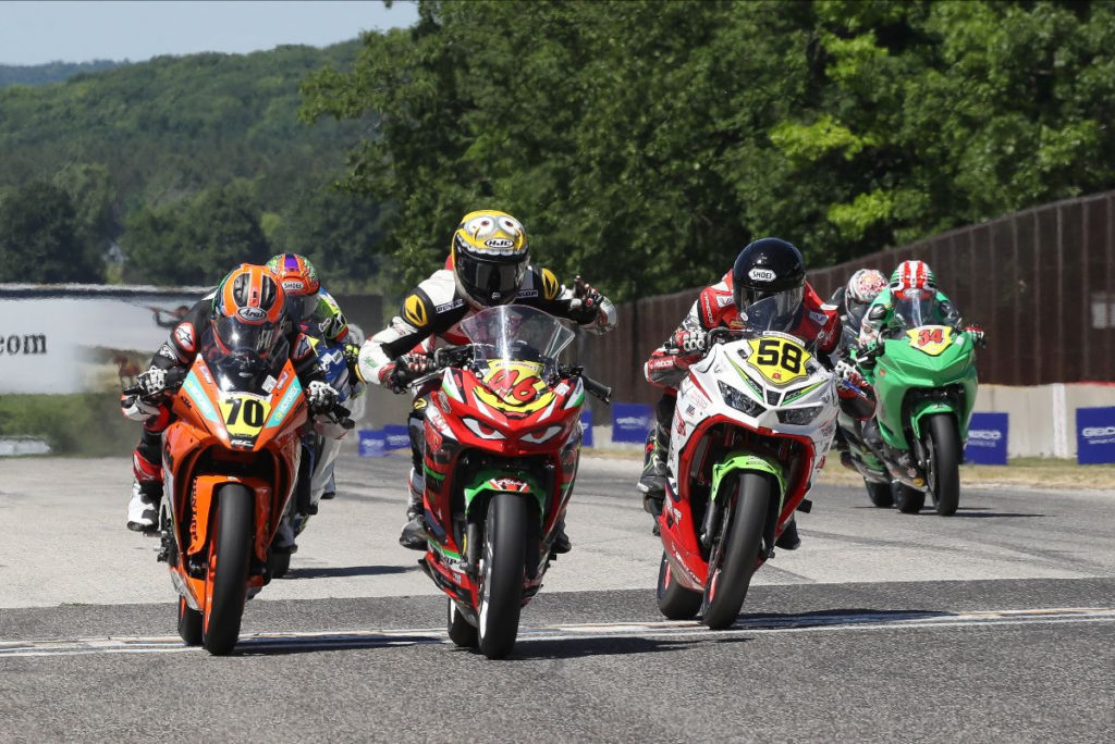 Gus Rodio (96) just beat Tyler Scott (70) and Max Toth (58) to the finish line in Junior Cup Race Two. Photo by Brian J. Nelson.