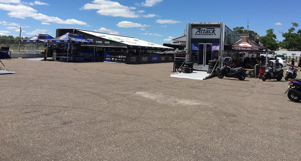The Fresh N' Lean Attack Performance Yamaha (left) and Westby Racing (right) transporters in the paddock at Brainerd International Raceway's Competition Road Course in Minnesota.