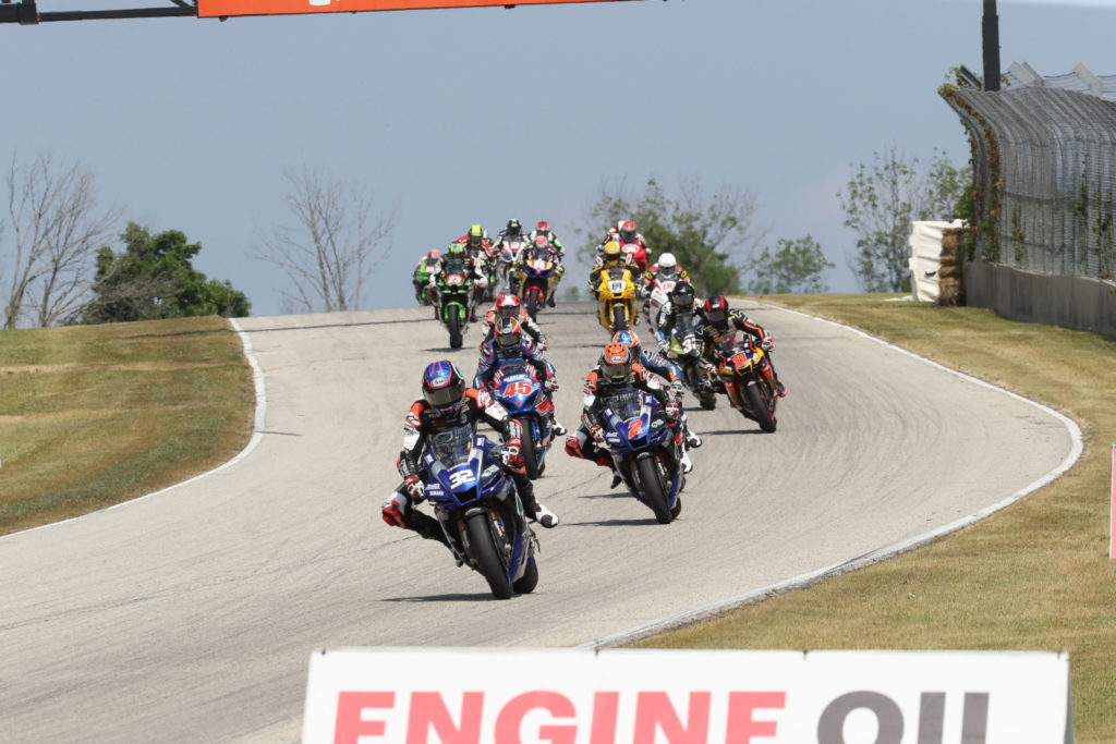 Jake Gagne (32) leads the start of MotoAmerica Superbike Race One at Road America. Photo by Brian J. Nelson.