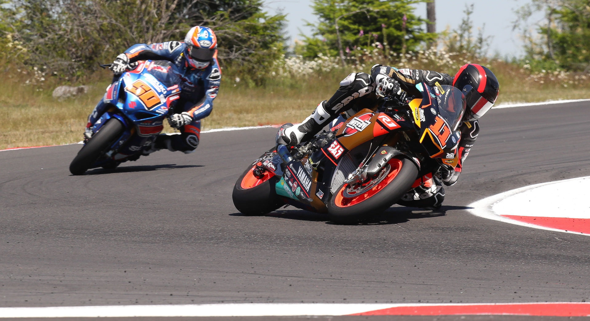 Mathew Scholtz (11) and Bobby Fong (50) in action at Ridge Motorsports Park. Photo by Brian J. Nelson, courtesy Westby Racing.