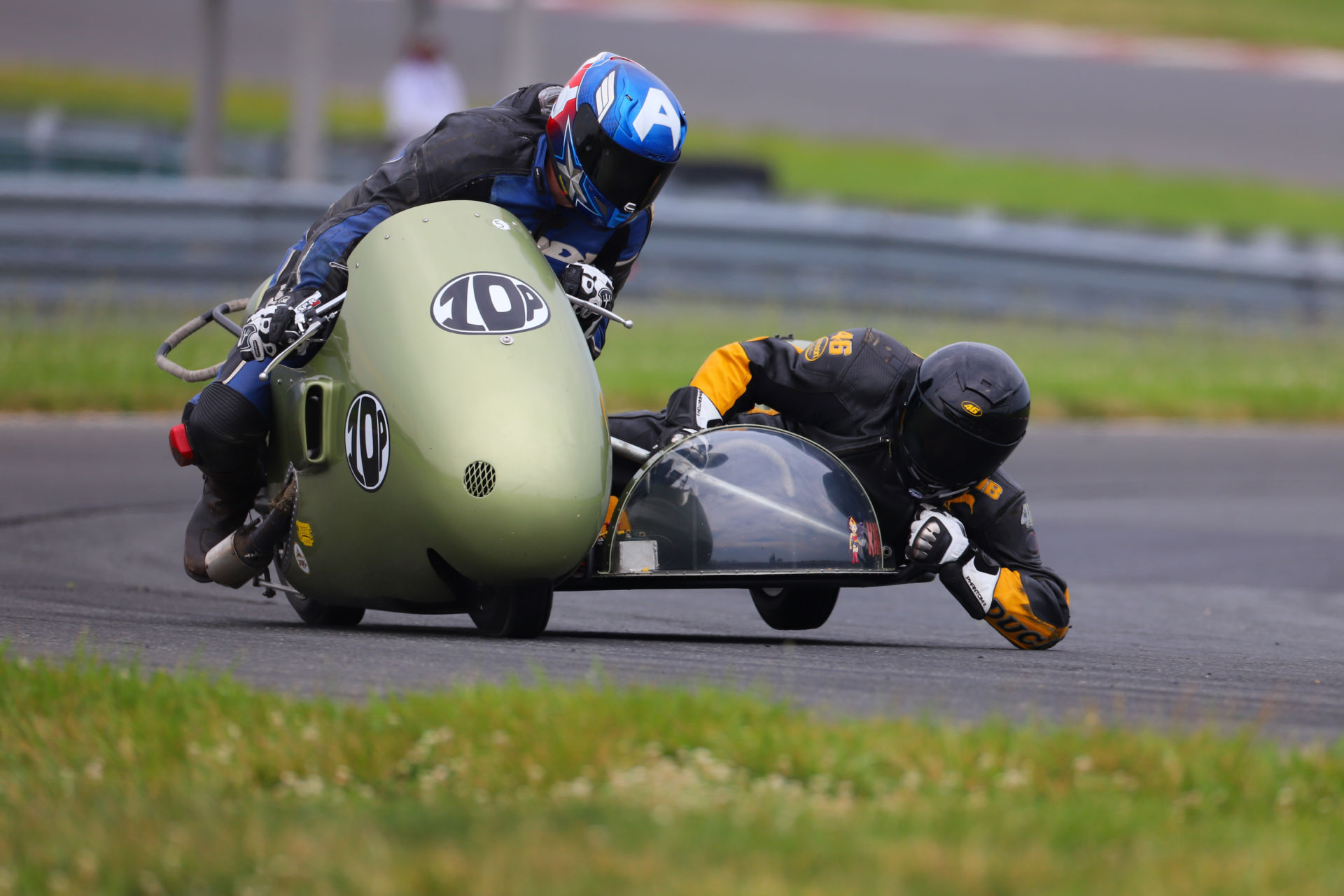 Michael Platt (10P) and passenger Bob Robbins in action at NJMP. Photo by etechphoto.com, courtesy AHRMA.