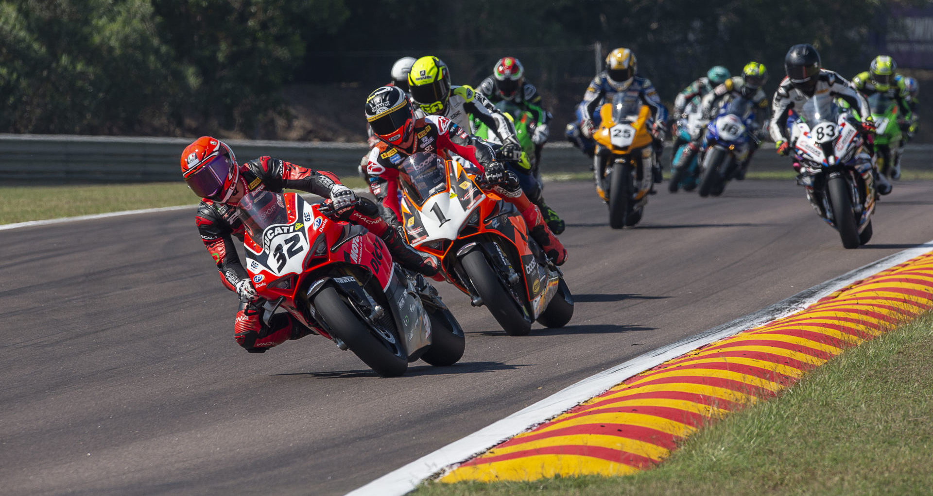 Oli Bayliss (32) leads Wayne Maxwell (1) in Australian Superbike Race Three at Hidden Valley Raceway. Photo by Optikal Photography, courtesy ASBK.