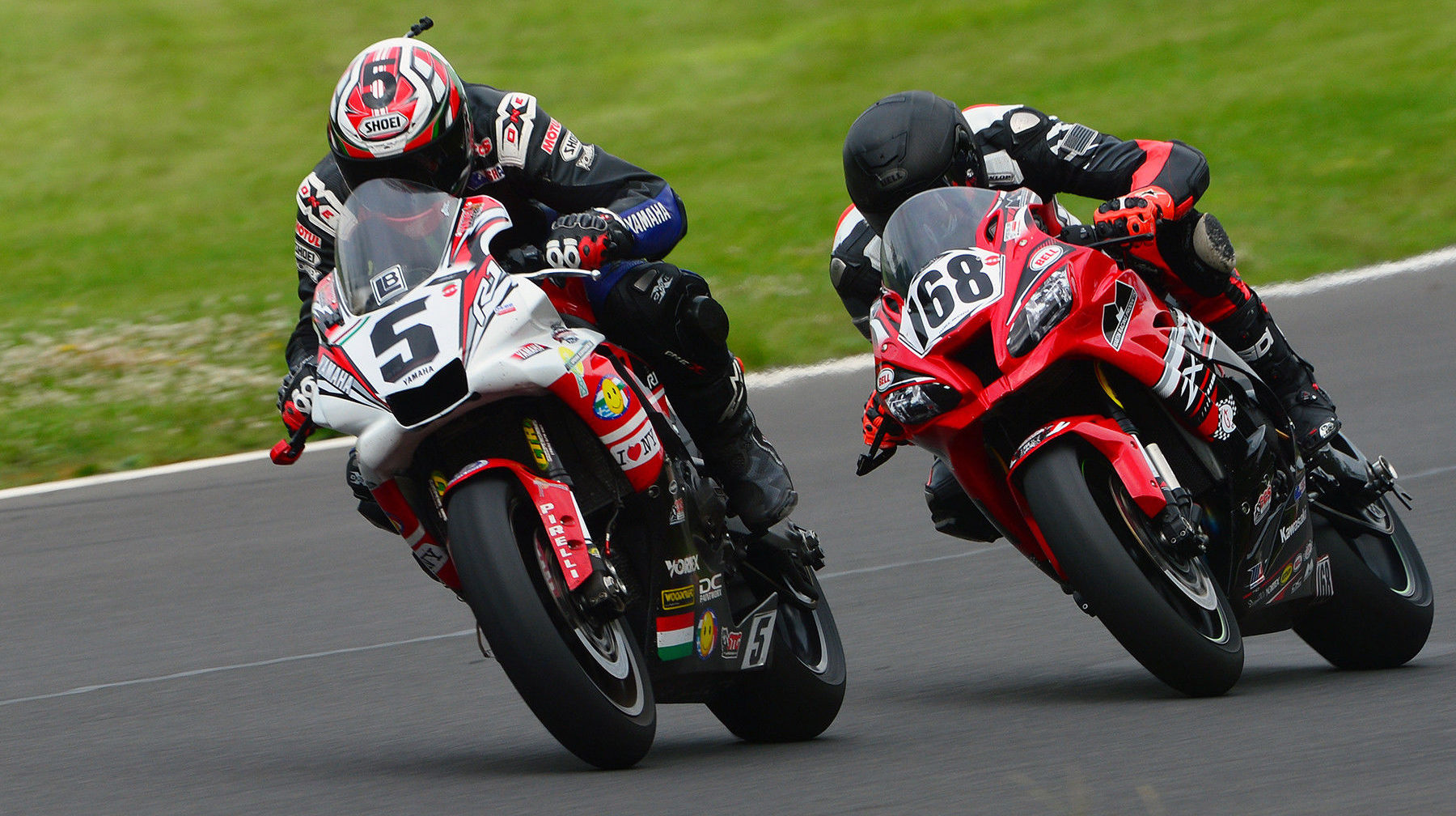 Antal Halasz (5) and Alan Nelson (168) fighting for position at Summit Point Motorsports Park. Photo by Lisa Theobald, courtesy ASRA/CCS.