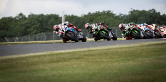 Tom Sykes (66) leads Jonathan Rea (1), Leon Haslam (91) and others during a World Superbike race at Donington Park in 2019. Photo courtesy BMW Motorrad Motorsport.