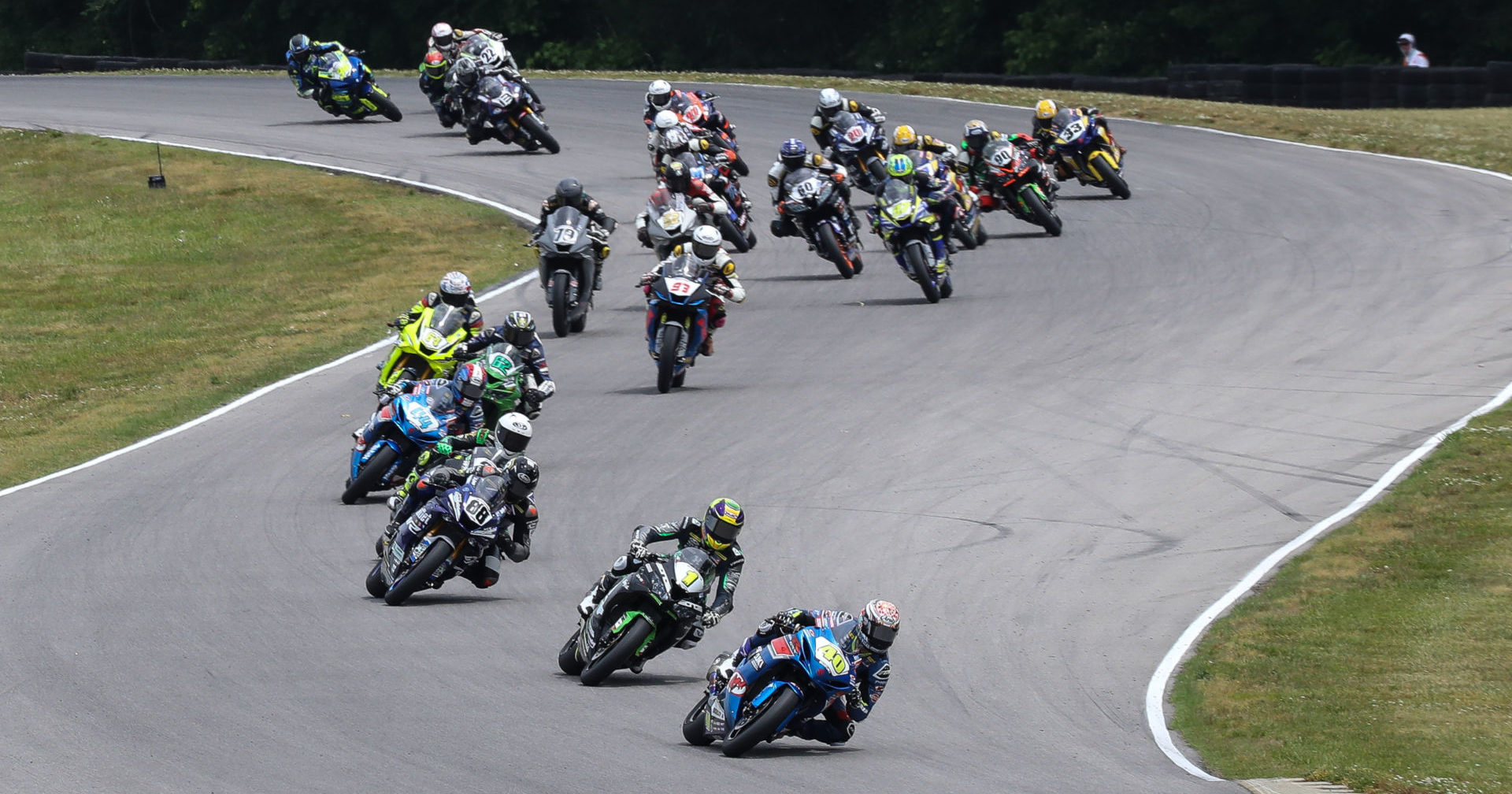Sean Dylan Kelly (40) leading Richie Escalante (1), Benjamin Smith (88) and the rest of the MotoAmerica Supersport field at VIR. Photo by Brian J. Nelson.
