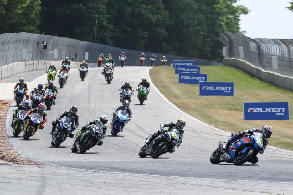 Sean Dylan Kelly (40) leads Richie Escalante (54), Stefano Mesa (37) and the rest of the Supersport field into Turn Five. Photo by Brian J. Nelson, courtesy MotoAmerica.