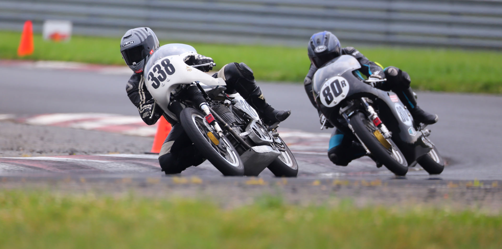 Tony Read (338) and Helmi Niederer (80R) racing for the lead at NJMP. Photo by Etechphotos.com, courtesy AHRMA.