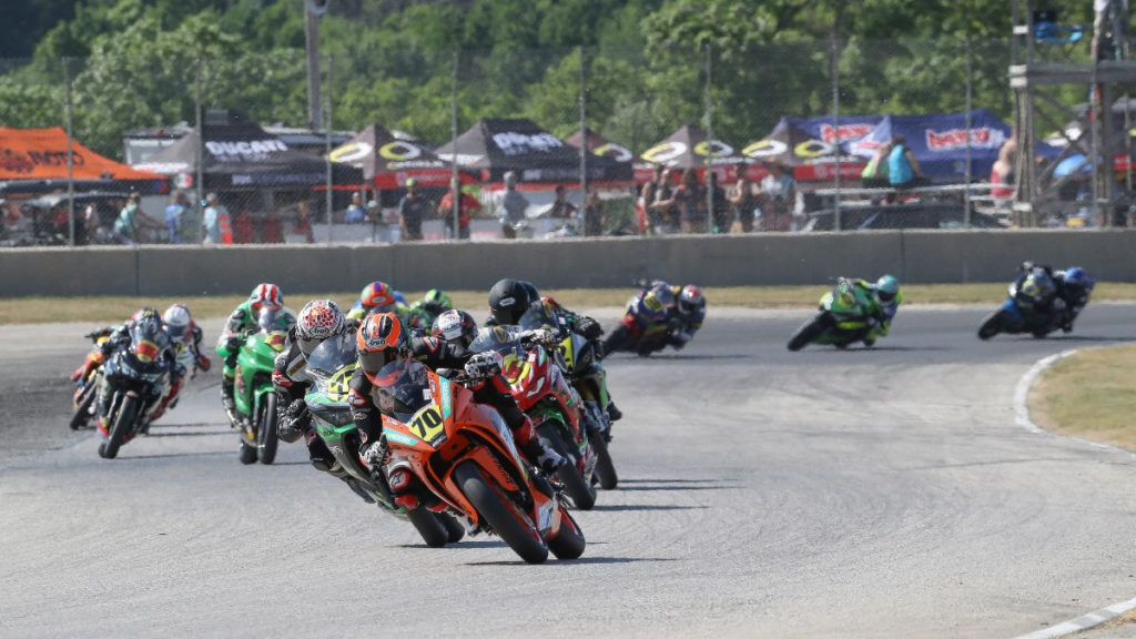 Tyler Scott (70) won a close battle in Junior Cup Race One. Photo by Brian J. Nelson, courtesy MotoAmerica.