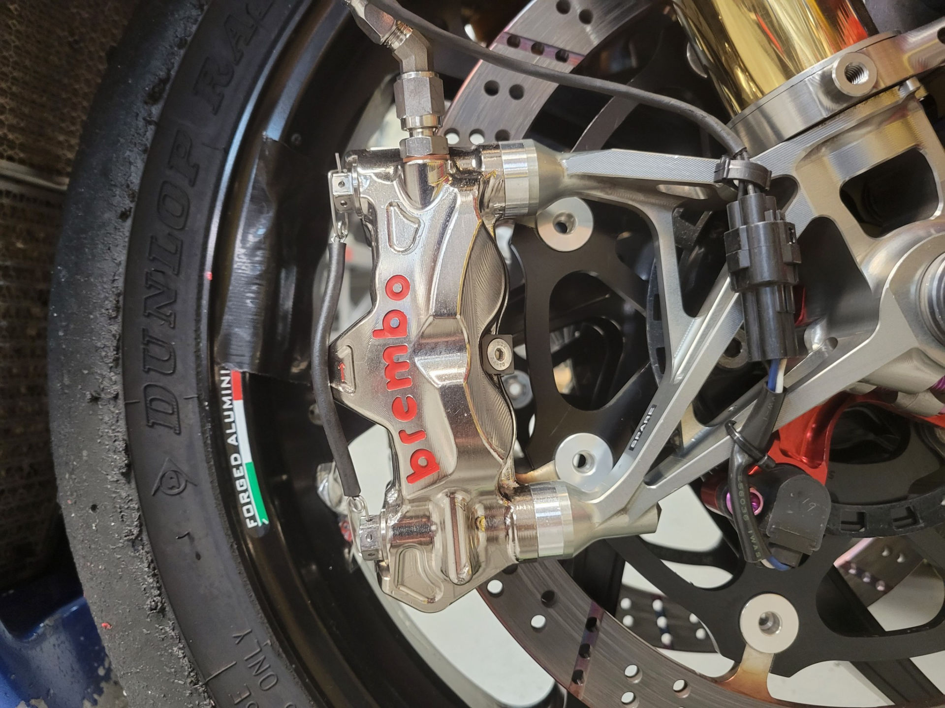 Brembo racing brake caliper on a MotoAmerica Superbike. Photo by Keith Perry.