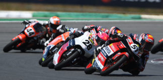 Brian Uriarte (51) leads Maximo Martinez (28) and a group of other riders during the Hawkers European Talent Cup race in Portugal. Photo courtesy FIM CEV Repsol Press Office.