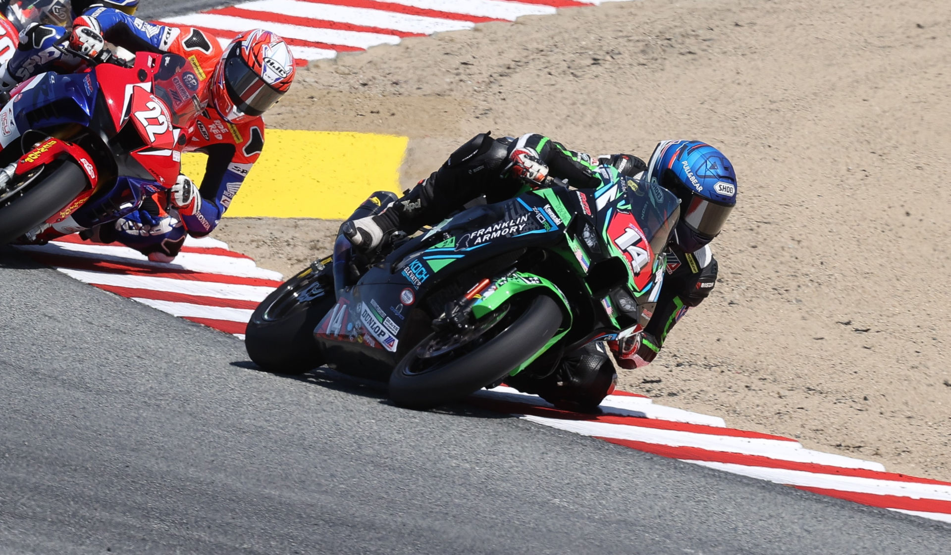 Andrew Lee (14) and Ashton Yates (22) in action at Laguna Seca. Photo by Brian J. Nelson.