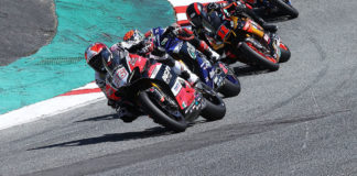 Loris Baz (76) leads Josh Herrin (2), Mathew Scholtz (11) and Bobby Fong (50) At Laguna Seca. Photo by Brian J. Nelson.