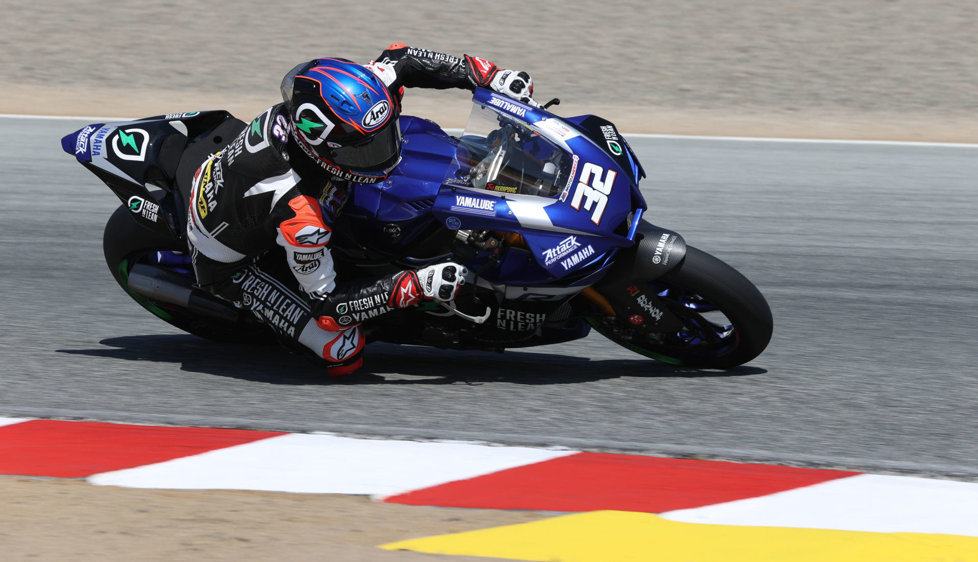 Jake Gagne (32) at speed at WeatherTech Raceway Laguna Seca. Photo by Brian J. Nelson.