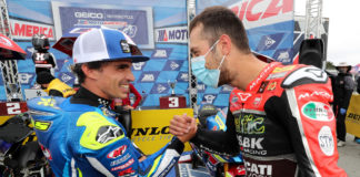 Toni Elias (left) shakes hands with Lorenzo Zanetti (right) after they finished third and second, respectively, in MotoAmerica Superbike Race Two at Laguna Seca in 2020. Photo by Brian J. Nelson.
