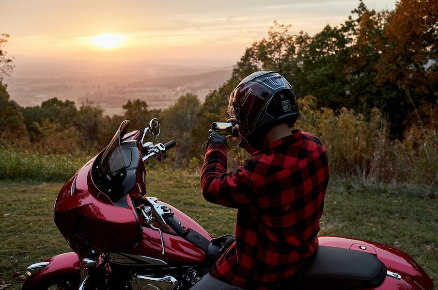 A rider enjoying a sunset from the seat of an Indian motorcycle. Photo courtesy Indian Motorcycle.
