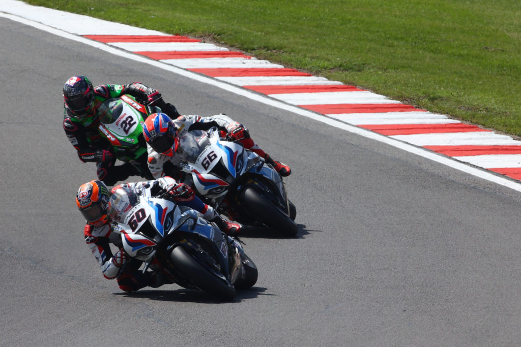 Michael van der Mark (60), Tom Sykes (66), and Alex Lowes (22) race for third. Photo courtesy Dorna.