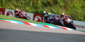 Jason O'Halloran (22), Glenn Irwin (2), Peter Hickman (behind O'Halloran), and Christian Iddon (21) in action during Race One at Thruxton. Photo courtesy MSVR.
