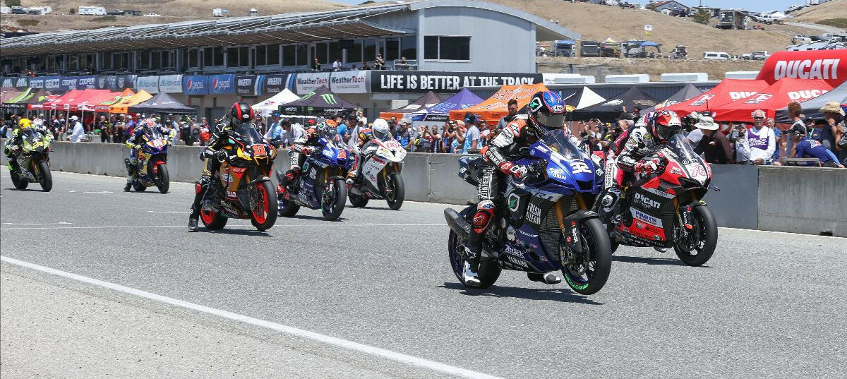 The start of MotoAmerica HONOS Superbike Race Two at Laguna Seca. Photo by Brian J. Nelson, courtesy MotoAmerica.