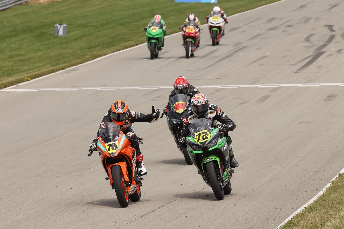 Tyler Scott (70) beat Ben Gloddy (72) by just 0.061 of a second to win the SportbikeTrackGear.com Junior Cup race. Photo by Brian J. Nelson.