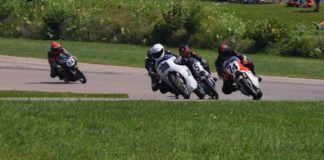 Tim Joyce (309), Wes Orloff (74), Andrew Mauk (X95, behind Joyce), and Brian Larrabure (14) at the start of an AHRMA Vintage Cup race at Gingerman Raceway. Photo by etechphoto.com, courtesy AHRMA.