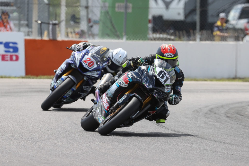 Austin Miller (61) leads CJ LaRoche (20) at Brainerd. Photo by Brian J. Nelson, courtesy Pure Attitude Racing.