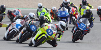 Hungarian-American Rossi Moor (92) leads Lorenz Luciano (81) and the rest of the Northern Talent Cup Field during Race One at Red Bull Ring, in Austria. Photo courtesy Dorna.