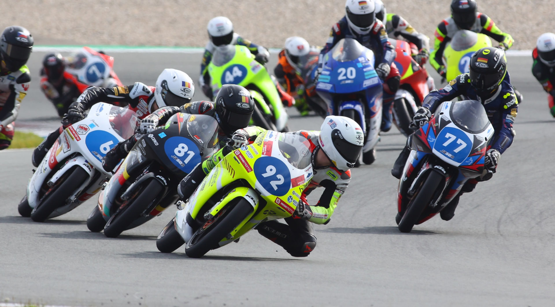 Hungarian-American Rossi Moor (92) leads Lorenz Luciano (81) and the rest of the Northern Talent Cup Field during Race One at Red Bull Ring, in Austria. Photo courtesy Dorna.