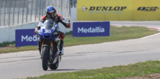 MotoAmerica Superbike racer Jake Gagne (32) with a Medallia sign in the background at Brainerd International Raceway. Photo by Brian J. Nelson.